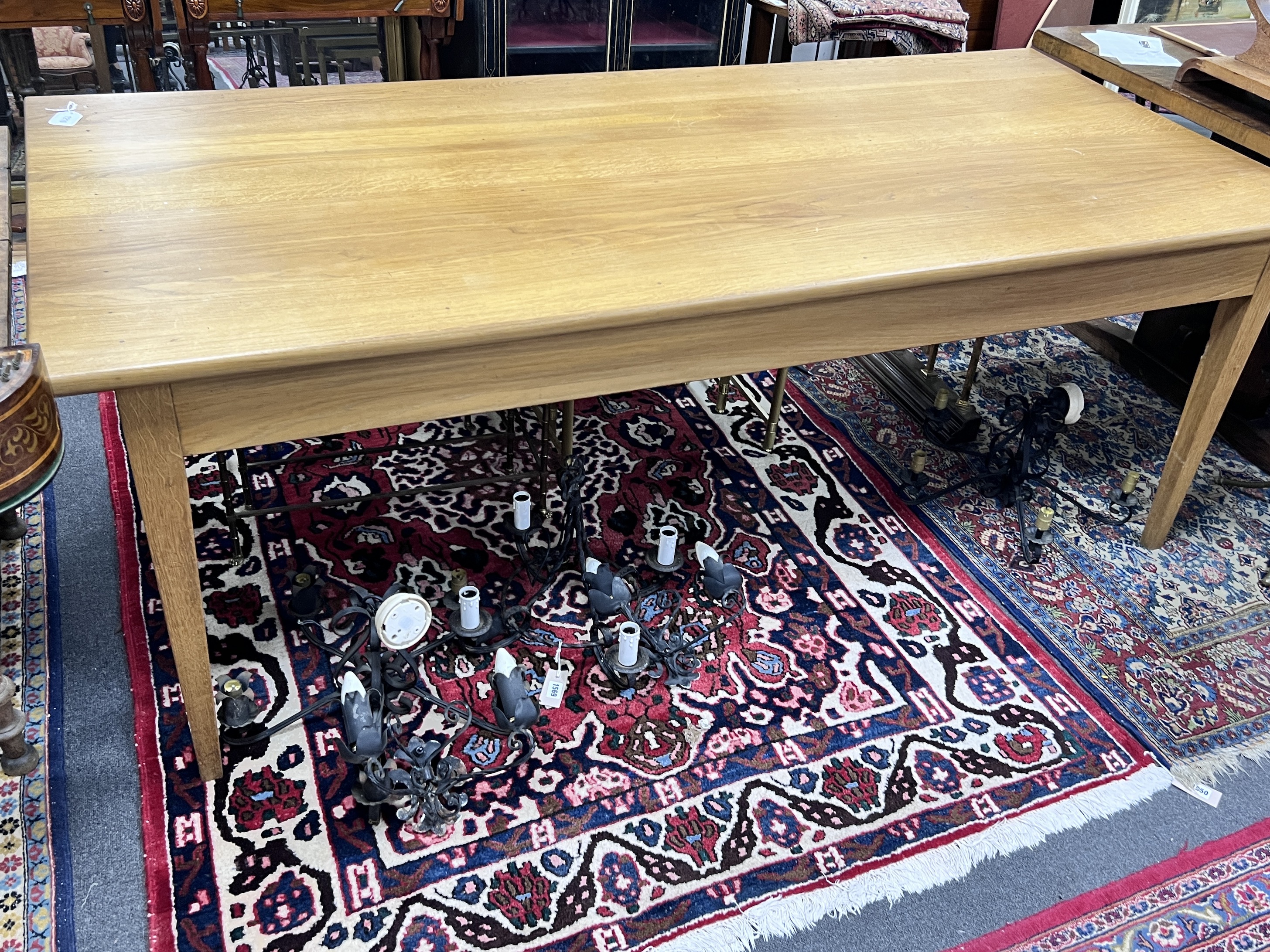 A contemporary oak refectory style dining table, length 200cm, width 89cm, height 72cm